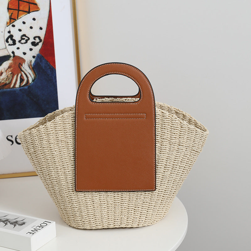 Fashionable basket bag with elegant leather accents Bowlift