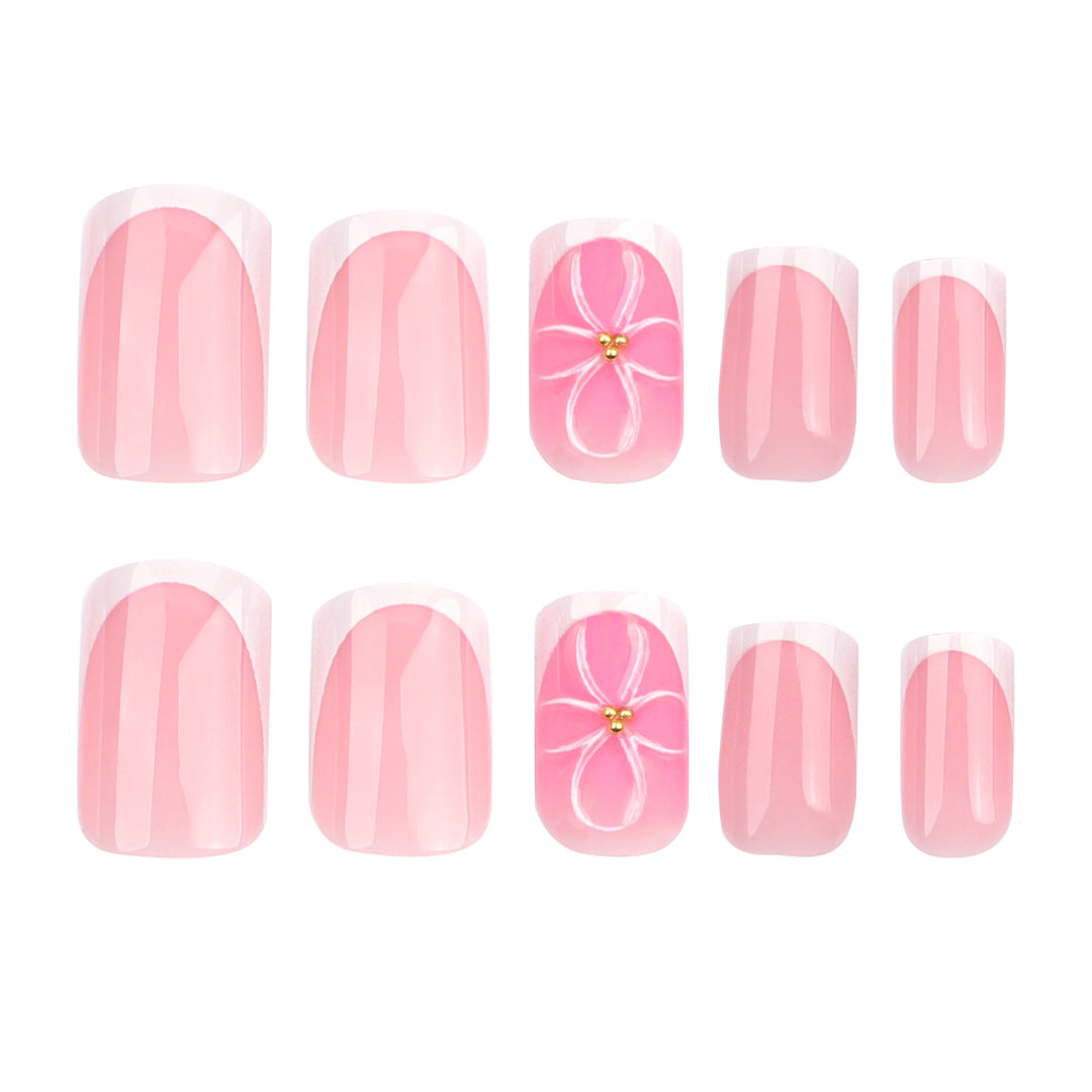 Artistic nail art with delicate flowers and elegant French lace Bowlift