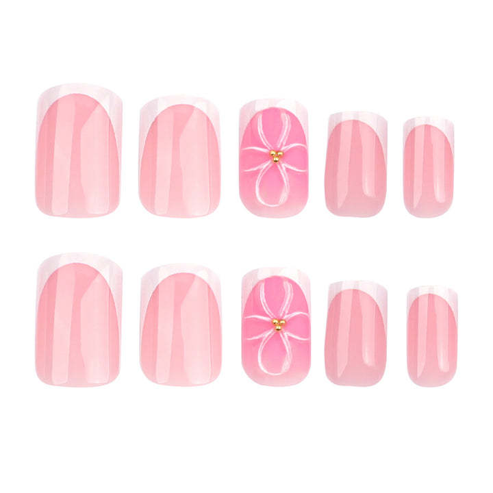 Artistic nail art with delicate flowers and elegant French lace Bowlift