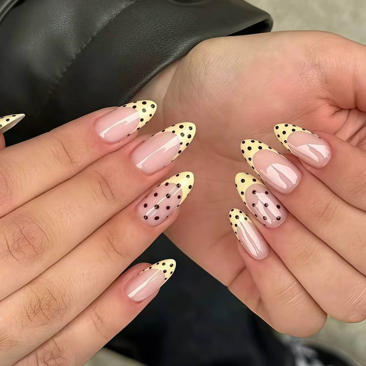 Elegant French Tip Nail Enhancements with Polka Dot Design Bowlift