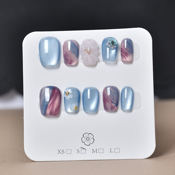 Elegant Nail Art Extensions with Pearl Accents Bowlift