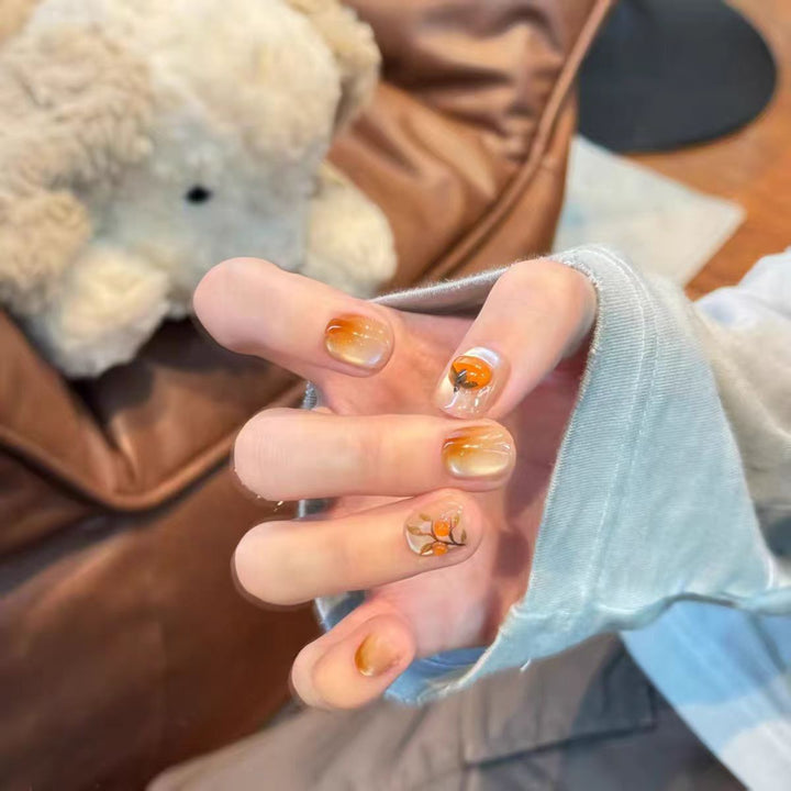 Artificial nails with elegant ombre effect and floral accents Bowlift