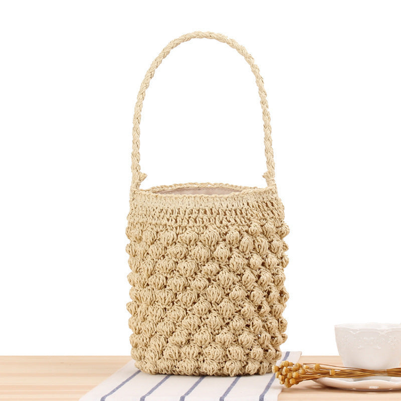 Hand-knotted bucket bag with textured surface Bowlift