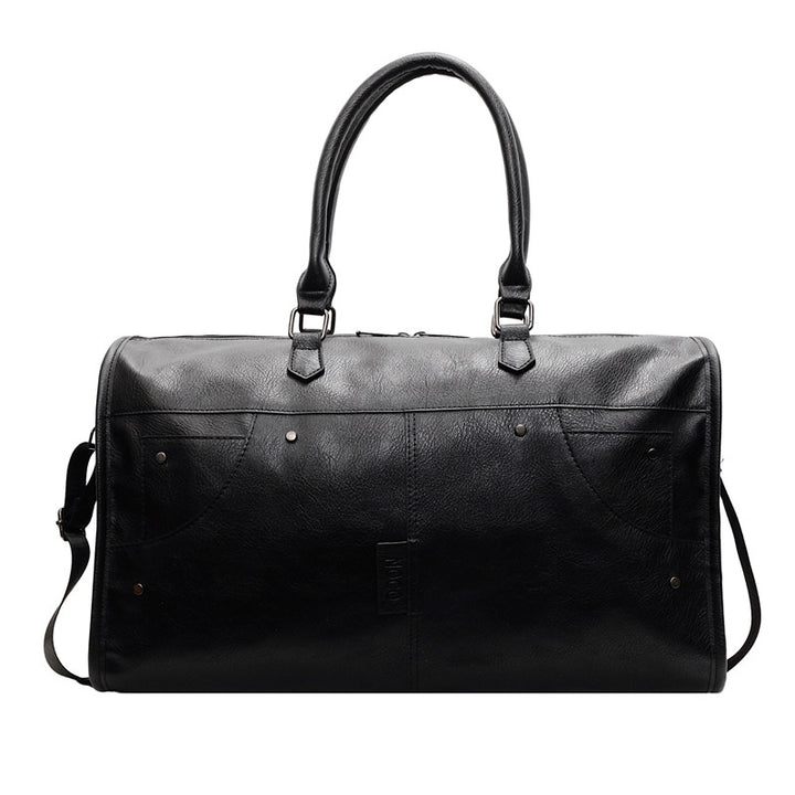 Elegant leather bag with stylish design and versatile carrying options Bowlift