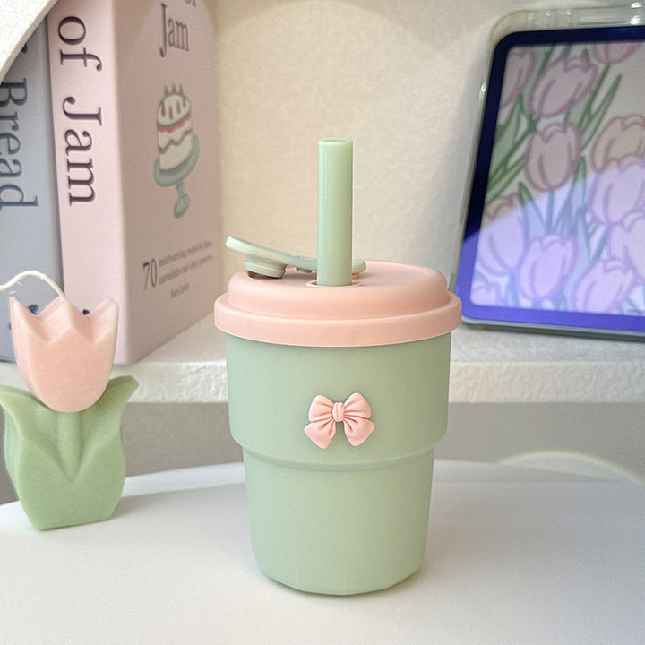 Women's Reusable Drinking Cup with Integrated Straw and Secure Closure Bowlift