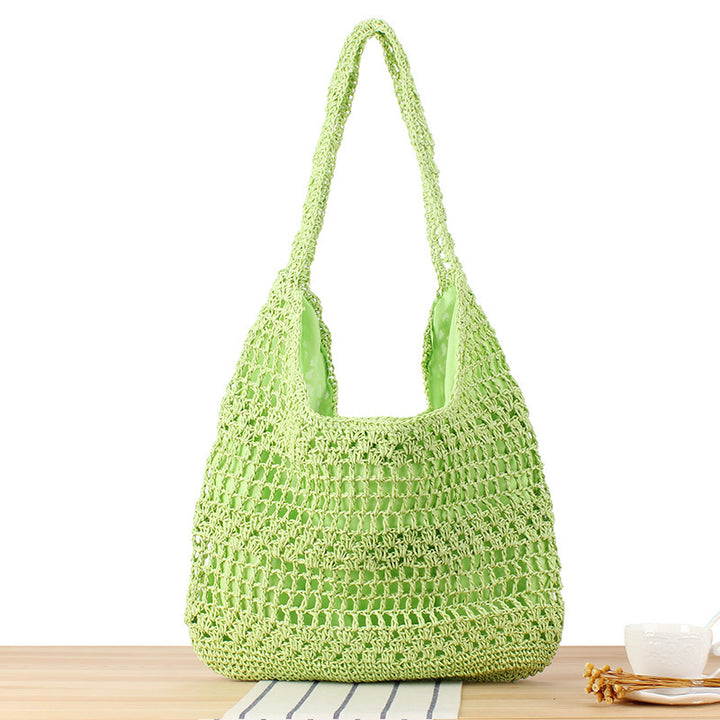 Handbag with floral appliqué Made of natural material Bowlift