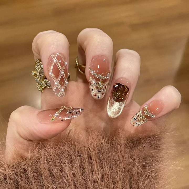 Artificial nails with glitter and heart accents Bowlift