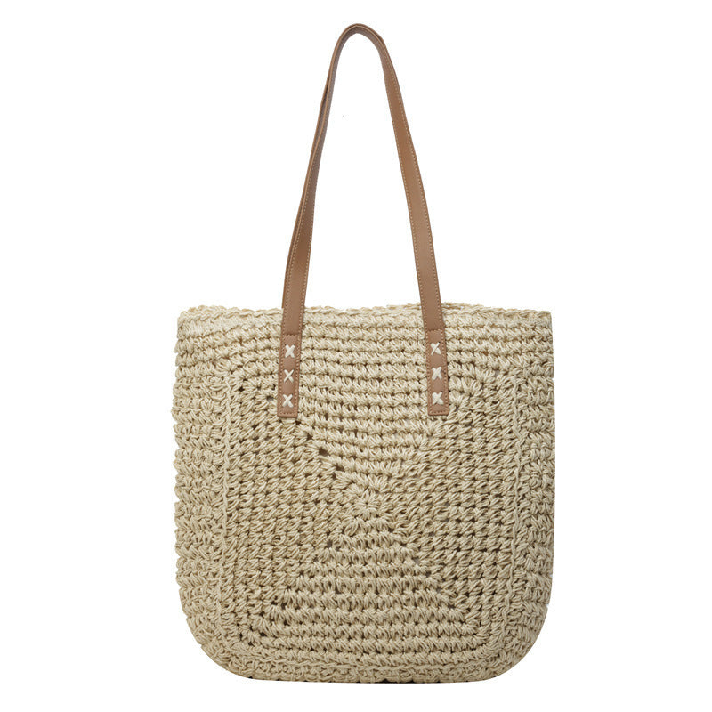 Braided beach bag with elegant leather details Bowlift
