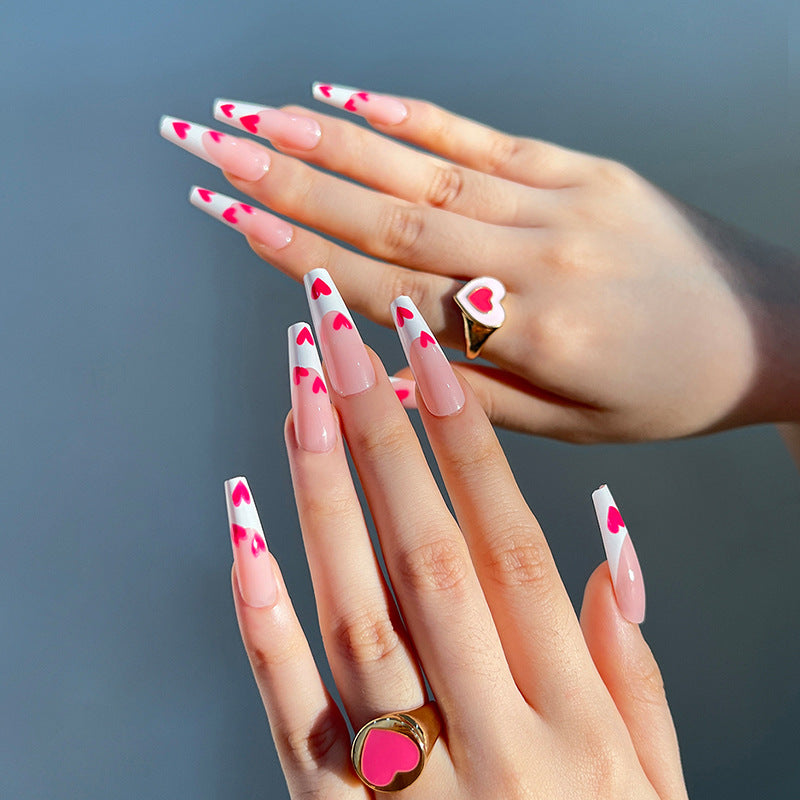 Artful Stiletto Nails with Hearts Design Bowlift