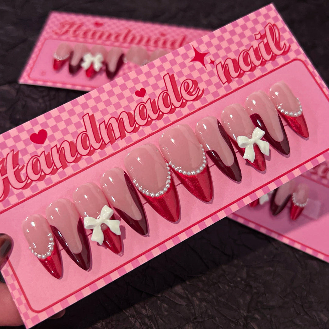 Artificial acrylic nails with detailed floral accents Bowlift
