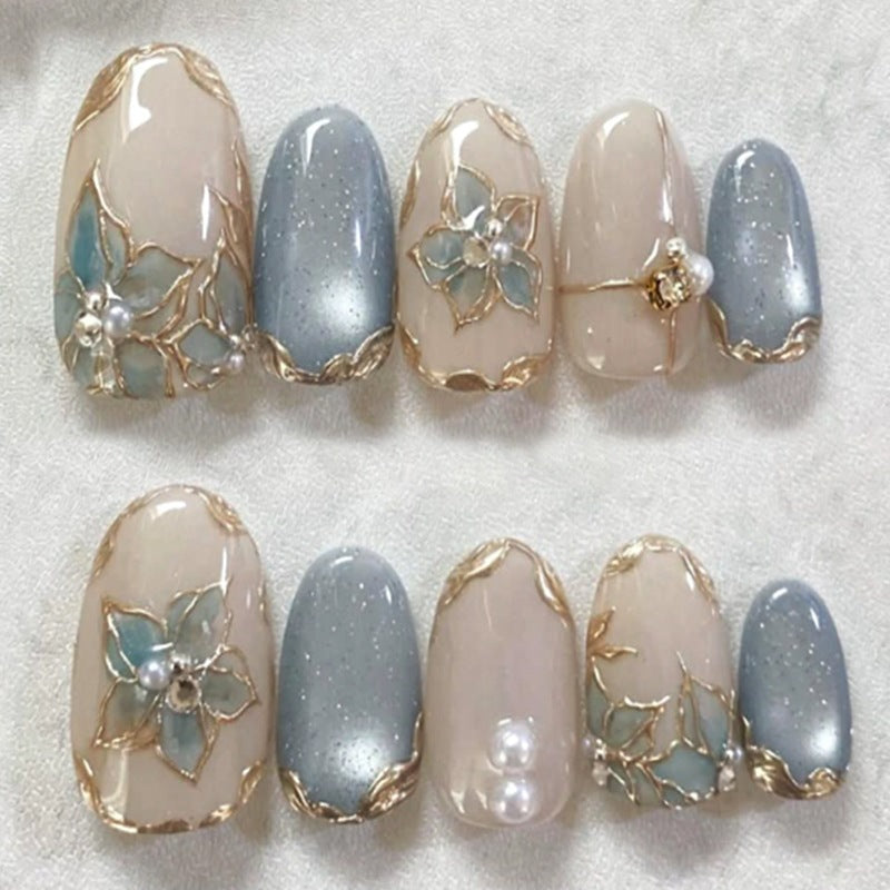 Artificial nail set with elegant floral decorations and shine Bowlift