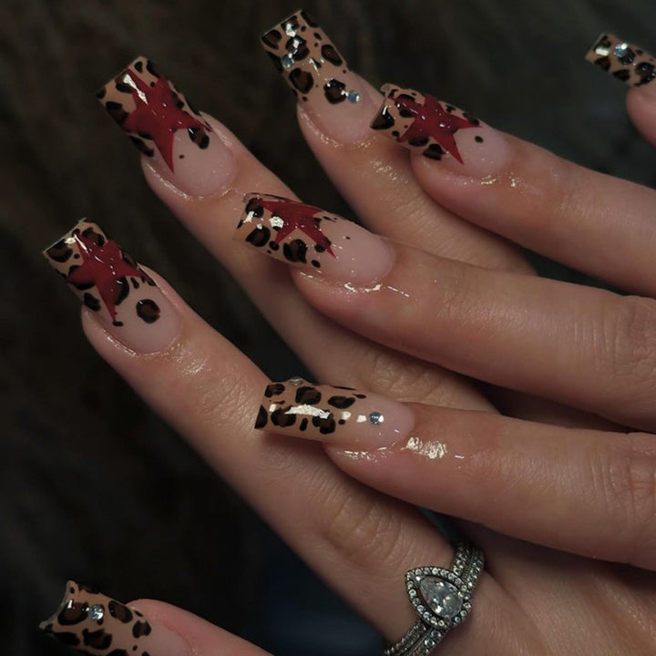 Acrylic nail set with exciting leopard pattern and glamorous accents Bowlift