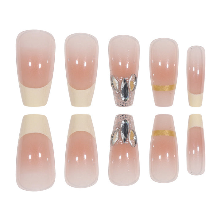 Elegant Long Press-On Nails with Rhinestone and Gold Accents Bowlift