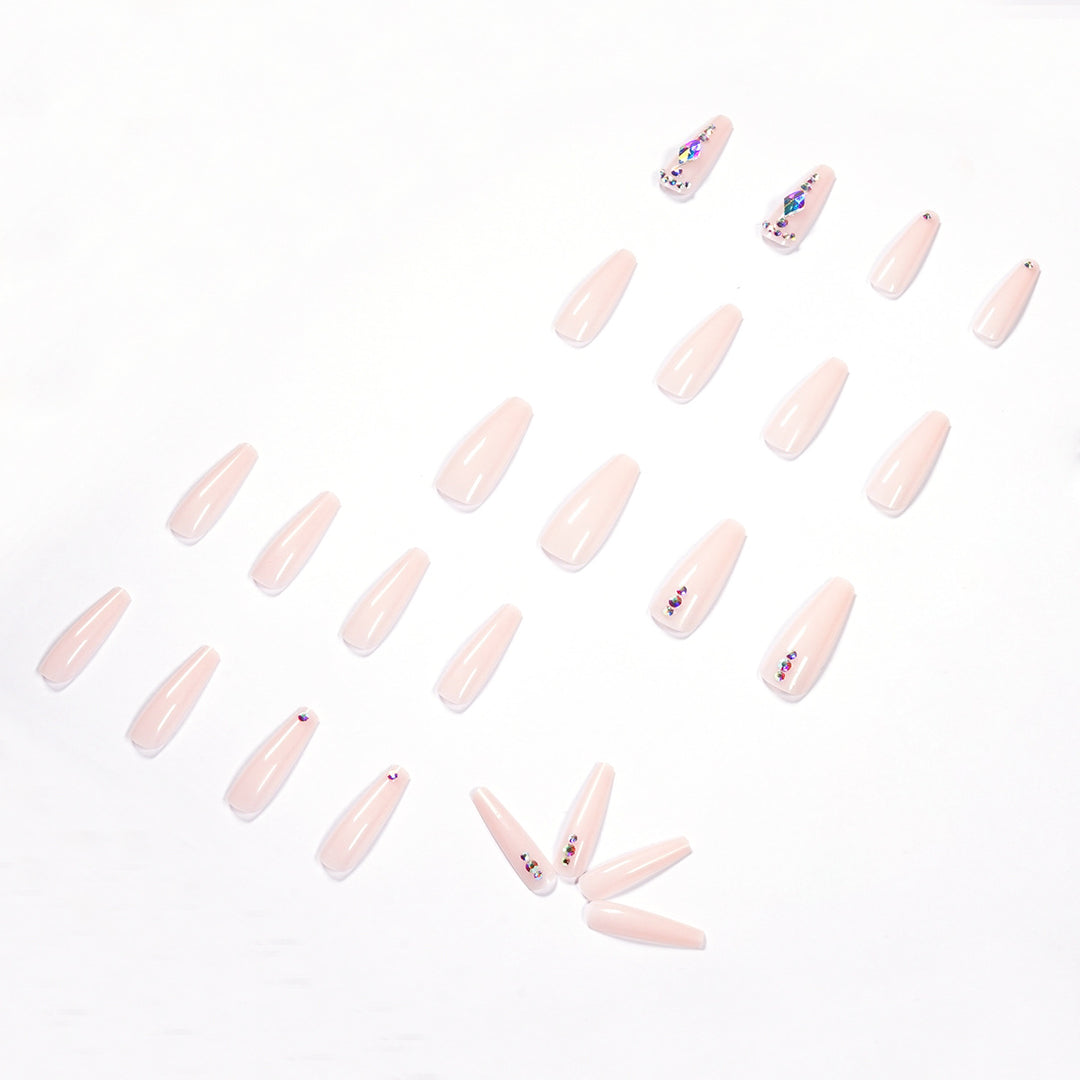 Glamorous nail extensions with rhinestone embellishments Bowlift