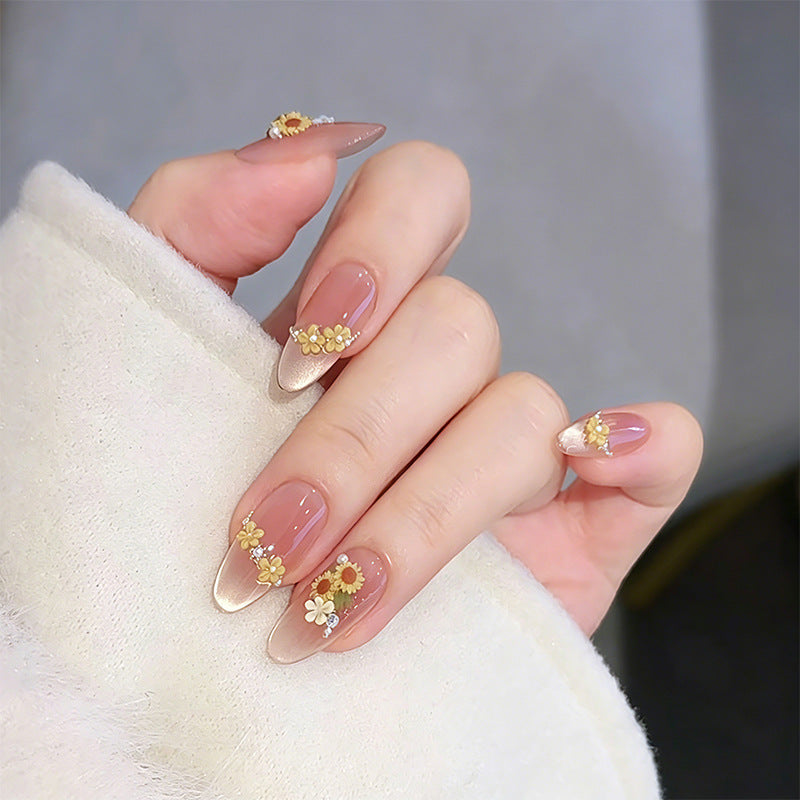 Artificial nail set with festive gift design and elegant glitter accents Bowlift