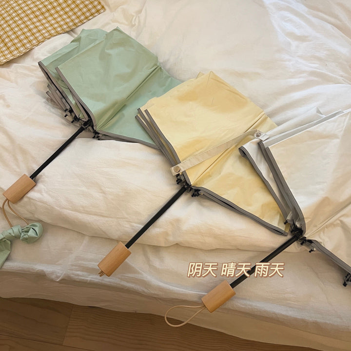 Women's automatic folding umbrella with elegant design and ergonomic wooden handle Bowlift