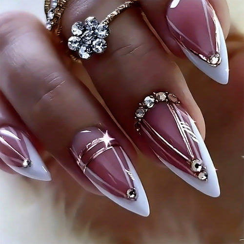 Acrylic nail set with elegant stiletto shape and luxurious embellishments Bowlift