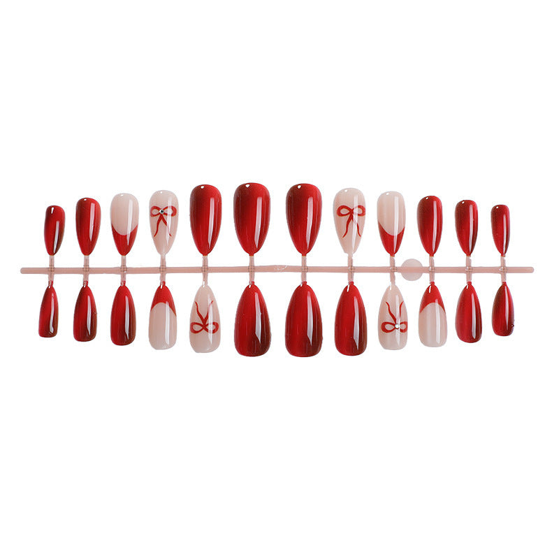 Designer artificial nails with elegant bow decoration Bowlift