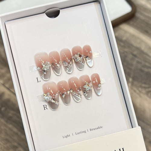 Elegant Press-On Almond Nails with Floral Accents Bowlift