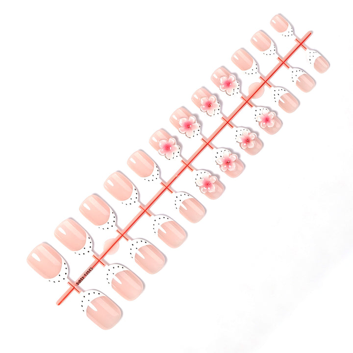 Artificial nail set with delicate floral designs and elegant accents Bowlift