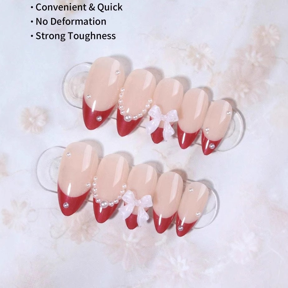 Artificial nail set with glamorous rhinestone and bow decorations Bowlift
