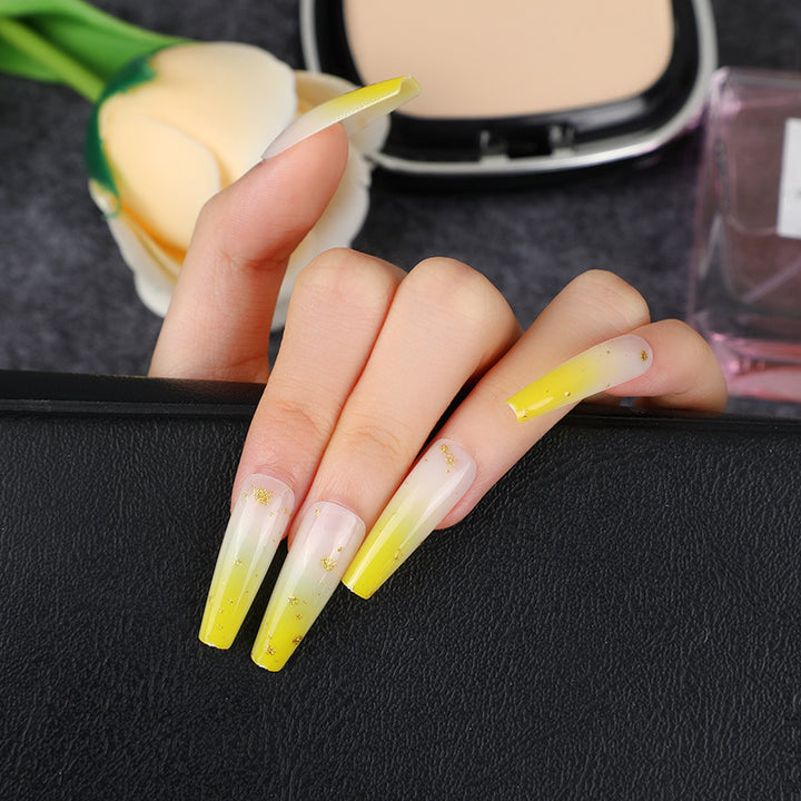 Elegant artificial nails with gold accents Bowlift