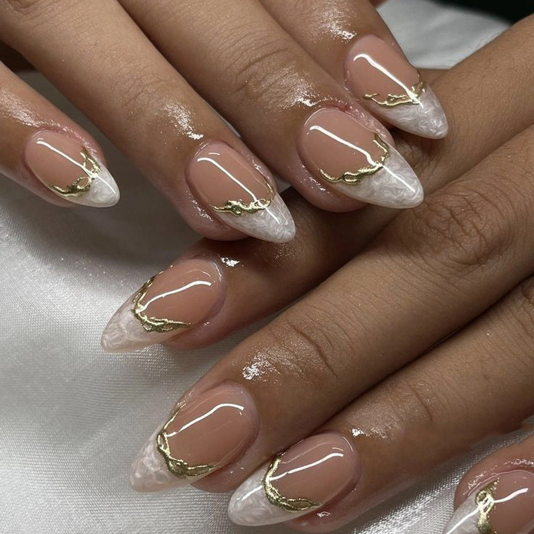 Artful Stiletto Nails with Golden Accents Bowlift