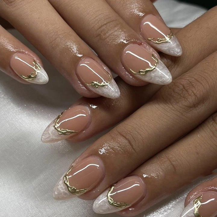 Artful Stiletto Nails with Golden Accents Bowlift