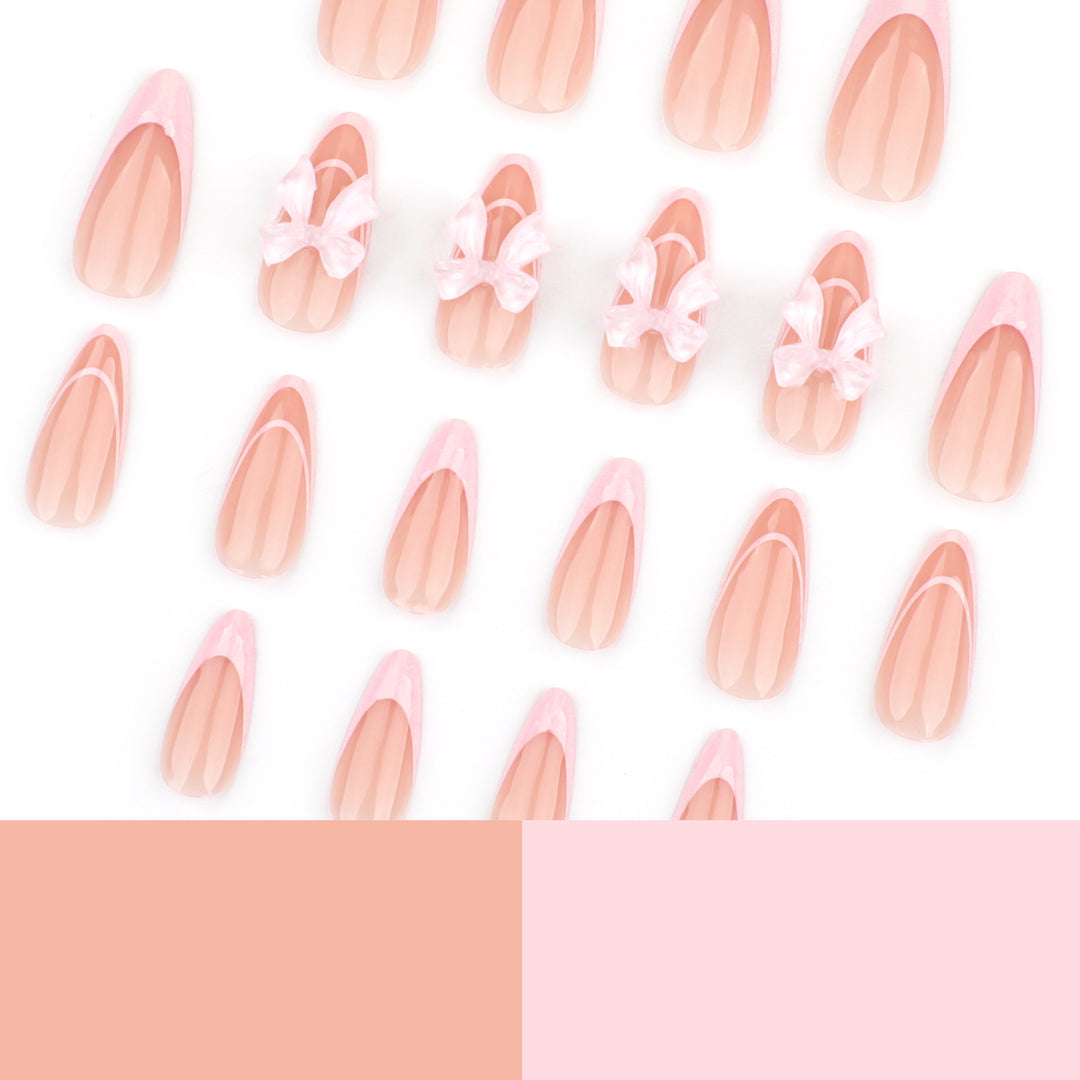 Artistic Nail Extensions with Transparent Bow Accents Bowlift