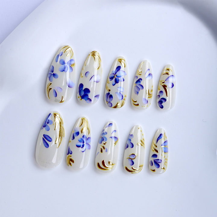 Artificial nails with exquisite floral and gold accents Bowlift