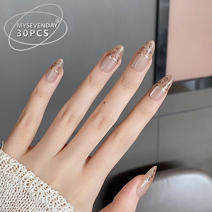 Elegant Press-On Nail Set with Gold Accent Tips Bowlift