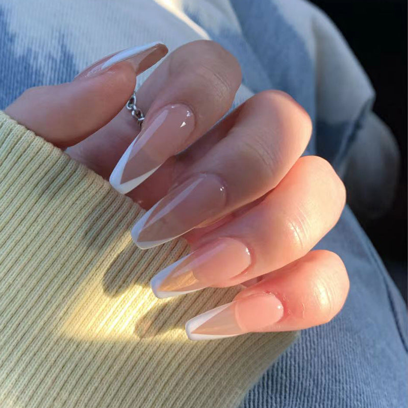 Artful Gel Nails with Elegant Floral Design and Glitter Accents Bowlift