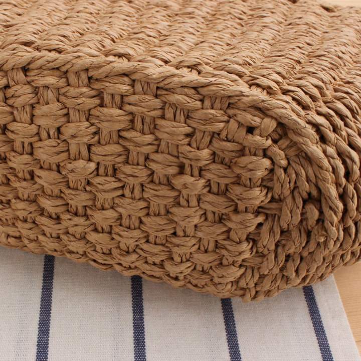Handbag made of braided natural material with elegant tassel decoration Bowlift
