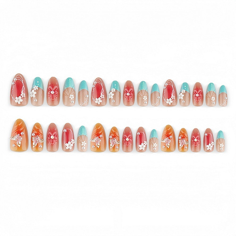 Artificial nail set with floral accents and glittering 3D applications Bowlift