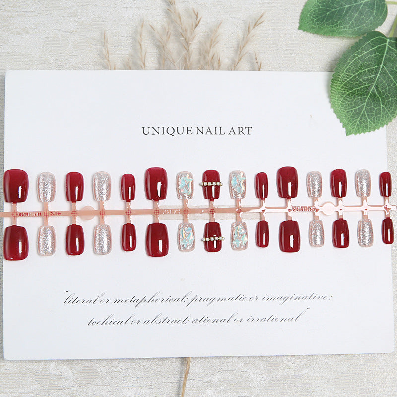 Glamorous artificial nail set with sparkling 3D applications and elegant embellishments Bowlift