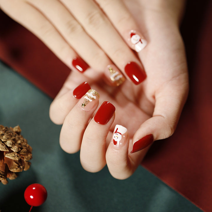 Elegant artificial nails with golden accents and floral design Bowlift