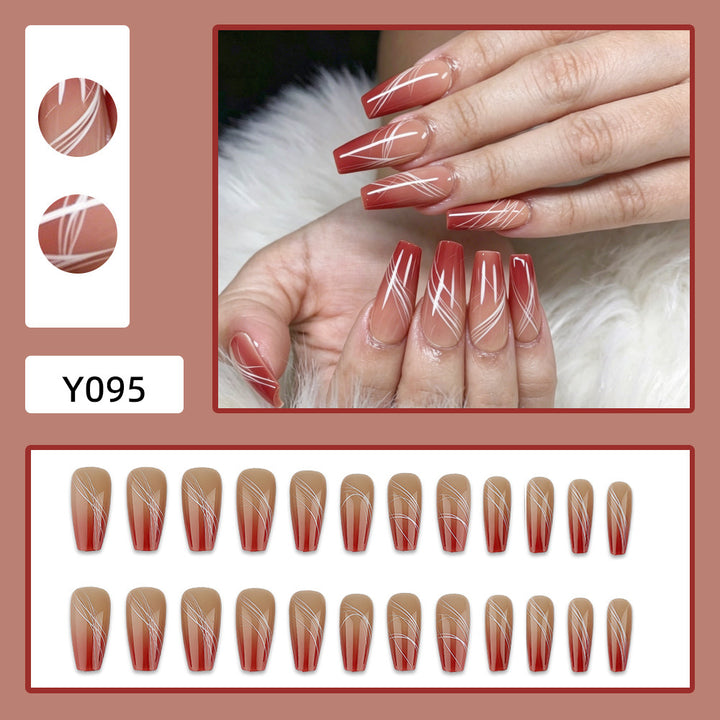 Artificial nails in elegant ombre design with fine lines Bowlift