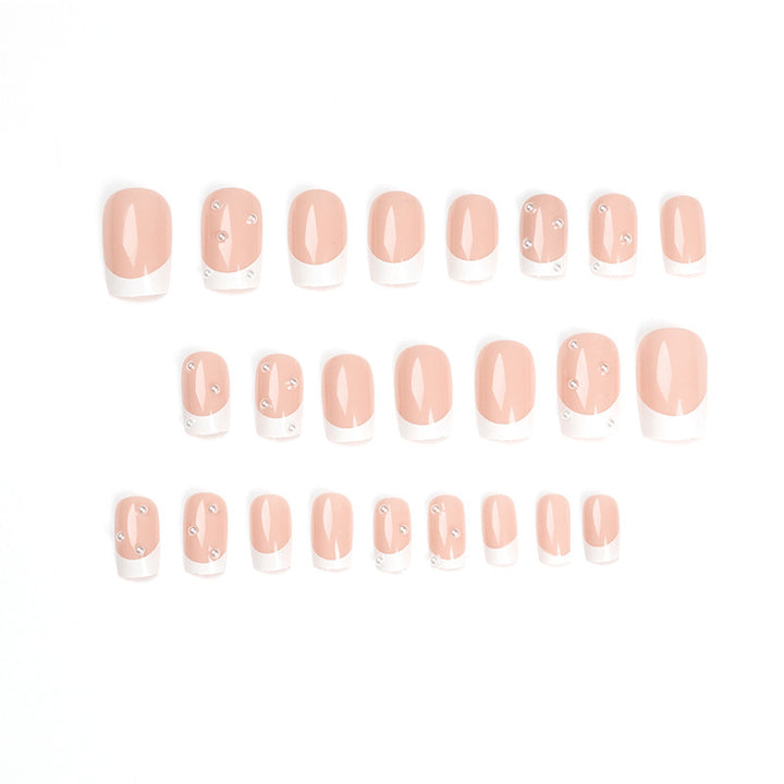 Artful nail art with elegant pearl and glitter accents Bowlift