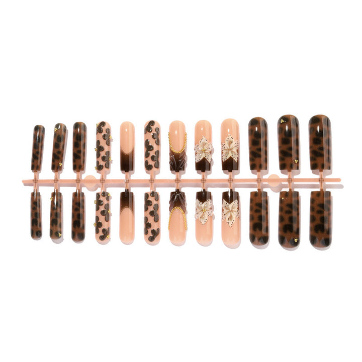 Nail design with floral accents and elegant details Bowlift