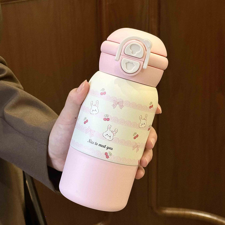 Women's insulated drinking bottle with practical flip lid and cheerful design Bowlift