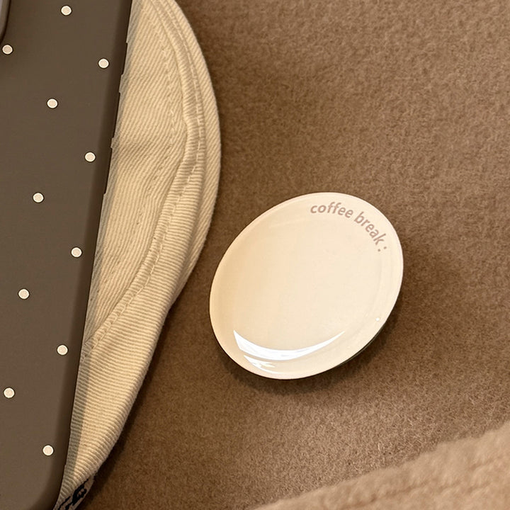 Decorative ceramic coaster with the inscription Bowlift