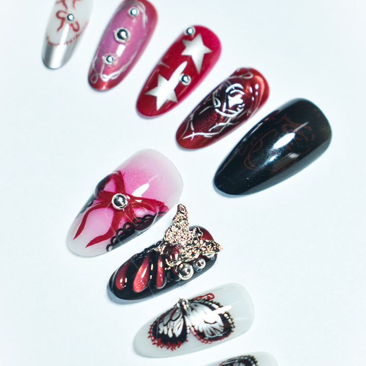 Artistic Press-On Nail Set with Butterfly and Star Details Bowlift