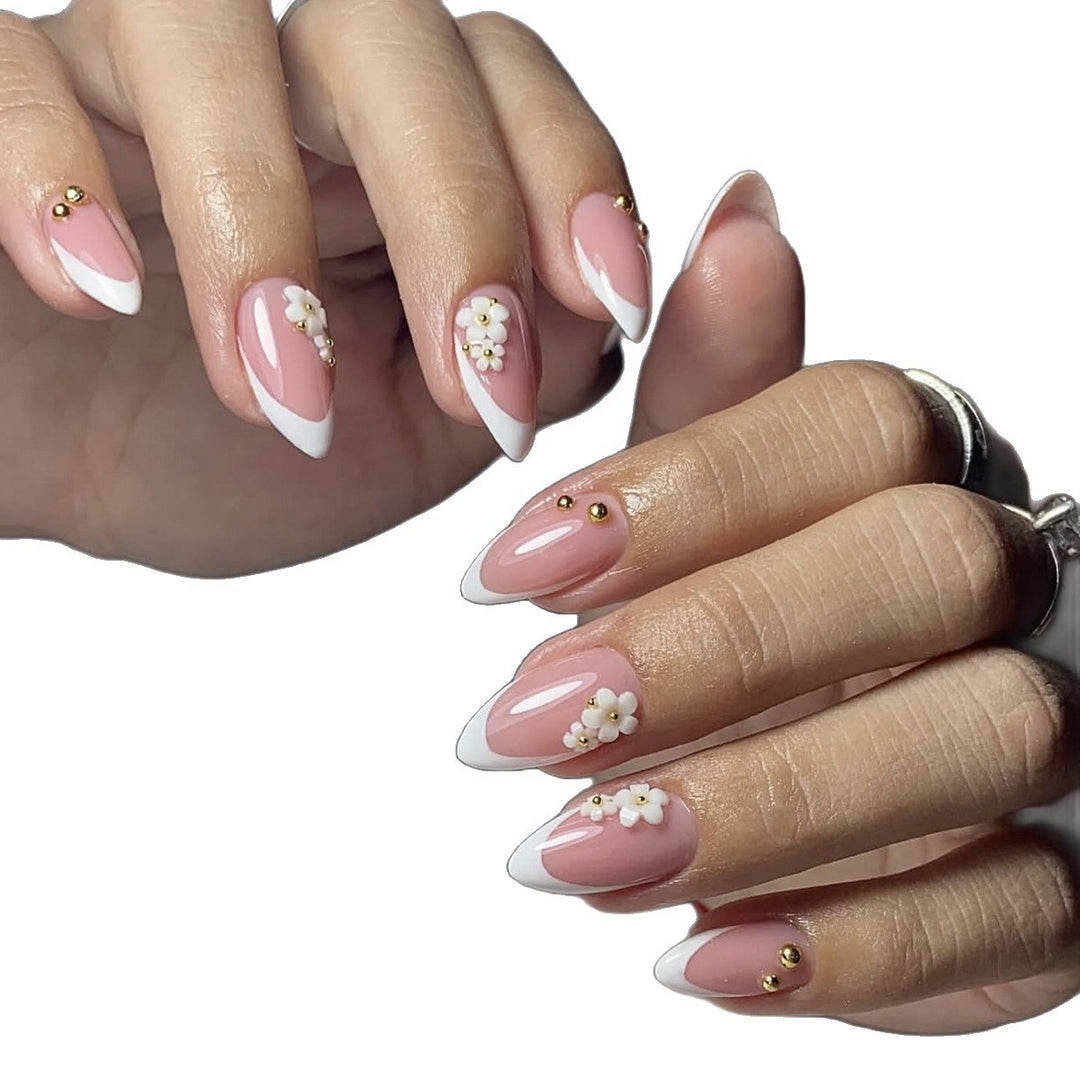 Artificial nail set with elegant floral accents and glitter Bowlift