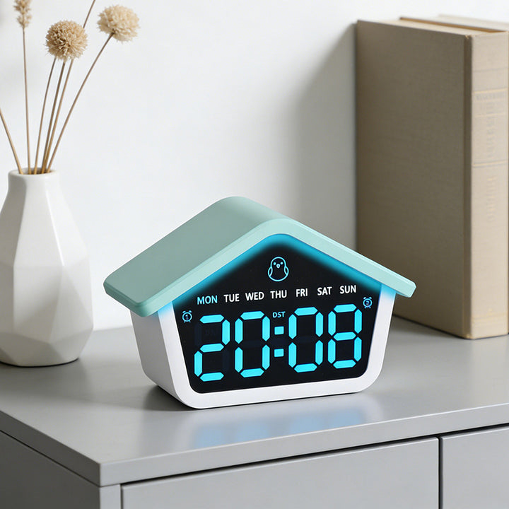Digital alarm clock in creative house design Bowlift