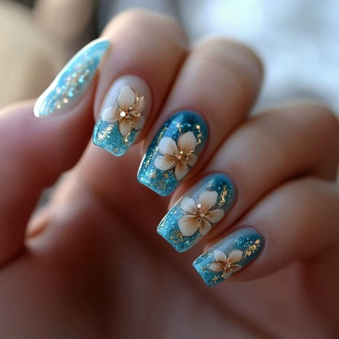 Artificial nail tips with floral accents and glitter Bowlift