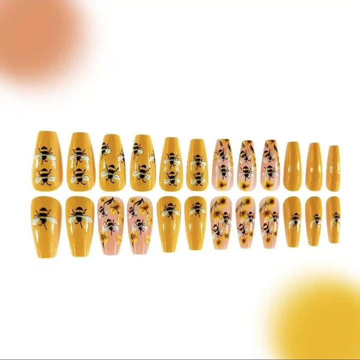 Nail art set with creative bee and flower designs Bowlift
