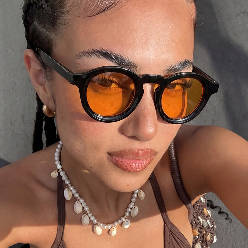 Women's fashionable round sunglasses with transparent frame and UV protection Bowlift