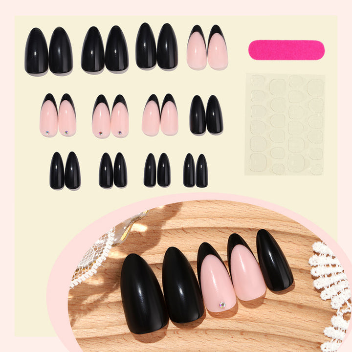 Acrylic nail set with elegant black-pink design and rhinestone-embellished accents Bowlift