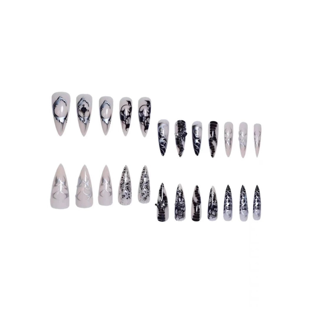 Artistic Stiletto Nail Extensions with Black Detailing Bowlift