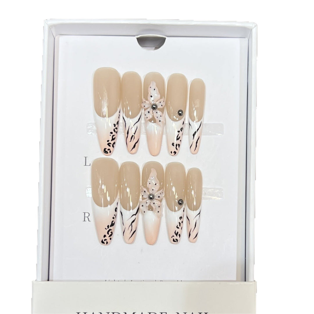 Artistic Stiletto Nail Art Set with Elegant Decorative Elements Bowlift